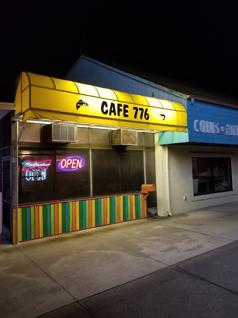 Surf-themed cafe dining room with casual tables.